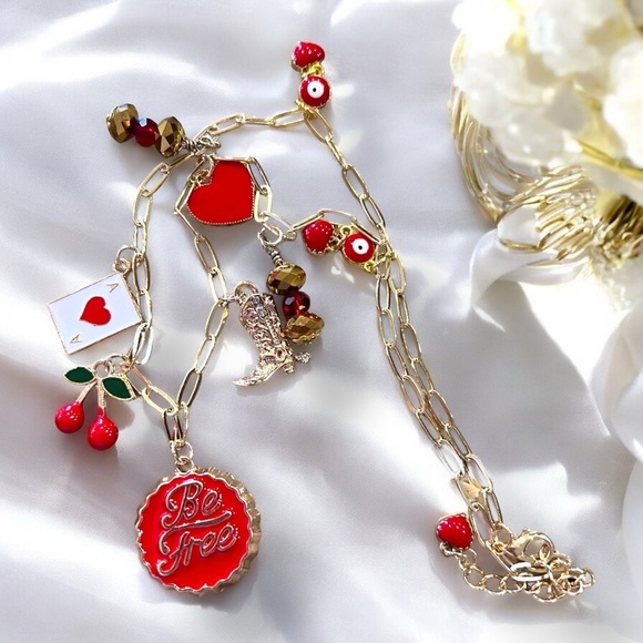 Jewelry - Gold toned dainty and fun Charm Necklace cherries, heart, boot and crystals